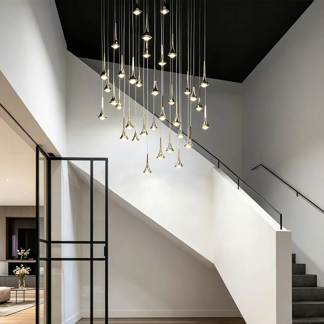 Cluster of teardrop pendants over stairs