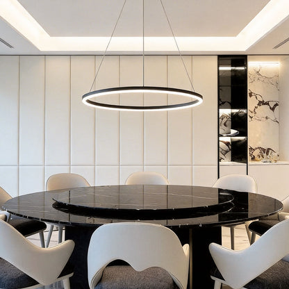Black ring chandelier in a dining room